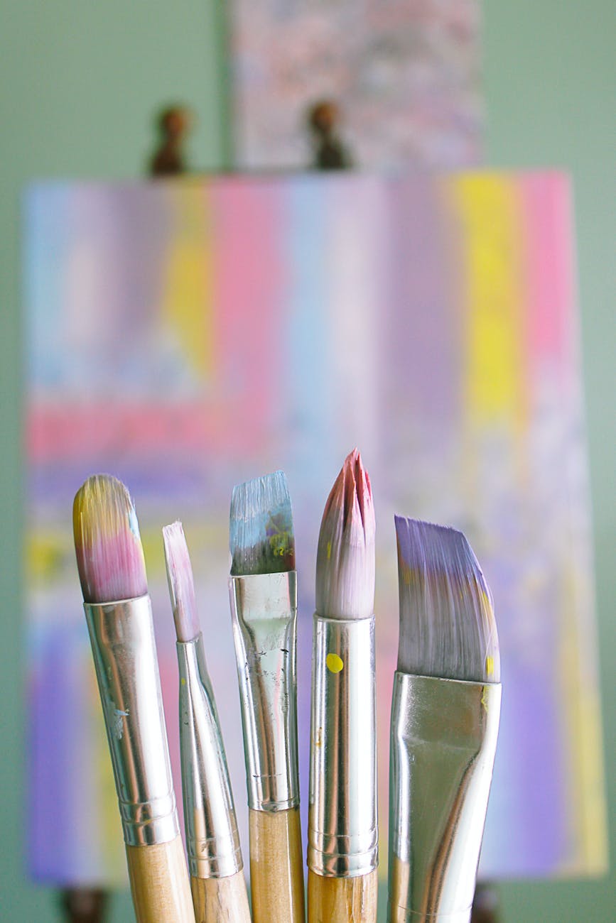 shallow focus photo of paint brushes